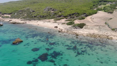 Tarifa Small Beach paradise beach in Cadiz Spain Drone footage Stock Footage 130184209