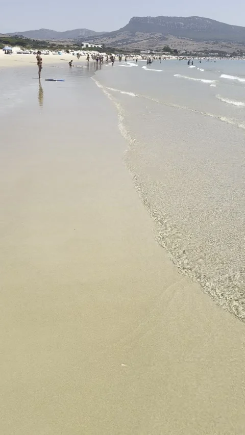 Tarifa summer walk at Duna de Bolonia beach Video stock 333190017