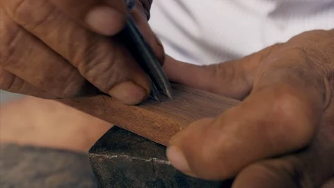 Tarkashi - Closeup shot of a worker working on a piece of wood with calipers Stock Footage 117470666