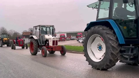 Tarleton UK. 2024 Dec 26: Boxing day vintage old Tractor parade in Lancashire Stock Footage 296328933