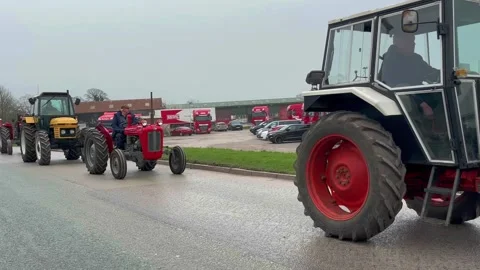 Tarleton UK. 2024 Dec 26: Boxing day vintage old Tractor parade in Lancashire Stock Footage 296328940