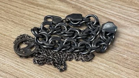 Tarnished silver chain before cleaning Stock Photos