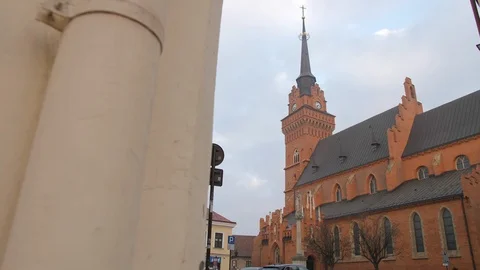 TARNOW, POLAND - Dec 19 2017: Main Church Reveal in Square in Tarnow, Poland Stock Footage 90256035