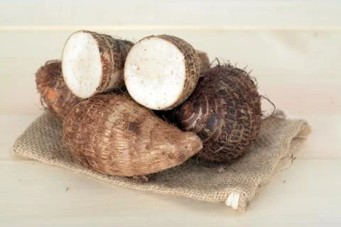 Taro root on the table Stock Photos
