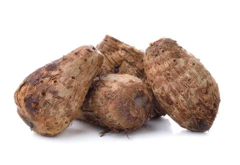 Taro root on white background Stock Photos