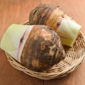 Taro on wood table background Stock Photos