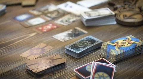 Tarot card reader arranges cards in a card spread. Fortune-telling concept Stock Photos