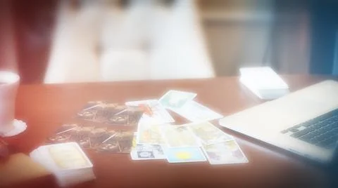 Tarot card reader arranges cards in a card spread. Fortune-telling concept Stock Photos
