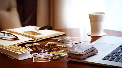Tarot card reader arranges cards in a card spread. Fortune-telling concept Stock Photos