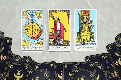 Tarot cards on grey table, flat lay Stock Photos