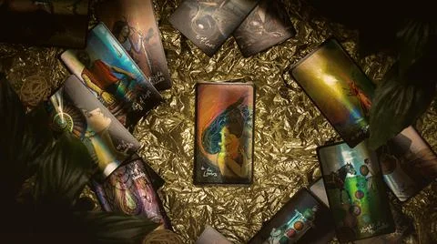 Tarot cards layout on witch table. Esoteric concept and astrology. Stock Photos