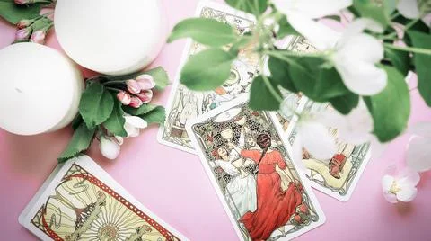 Tarot cards Summer layout on table. Esoteric and forecasting, Three of cups Stock Photos