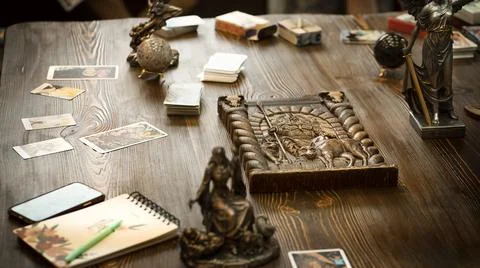 Tarot cards on the table, esoteric concept, fortune telling and predictions Stock Photos