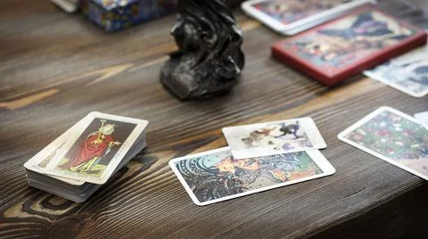 Tarot cards on the table, esoteric concept, fortune telling and predictions Stock Photos