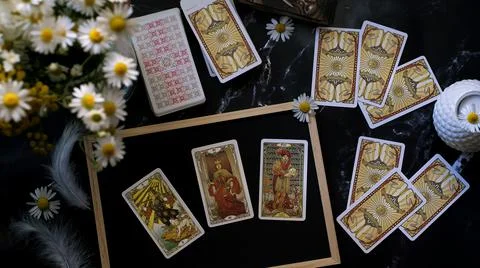 Tarot cards on the table, esoteric concept, fortune telling and predictions Stock Photos