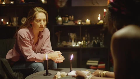 Tarot Expert Predicitng Fate to Client Stock Footage 247633644