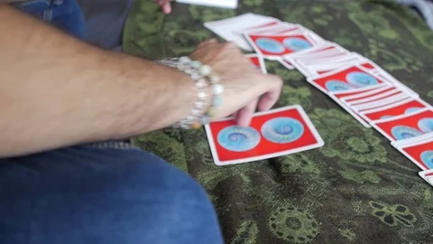 The tarot is a pack of playing Tarot cards Reader Reading Future And Fortune Stock Footage 105367045