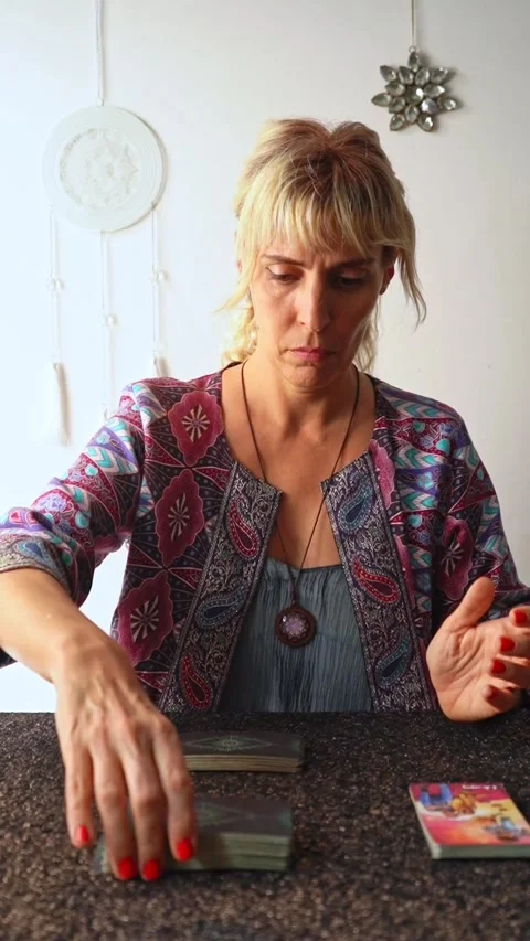 A tarot reader cutting the tarot deck Stock Footage 300522062