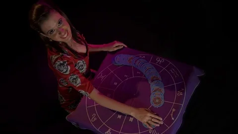 Tarot reader dealing cards &amp; reading future and fortune Stock Footage 76681112