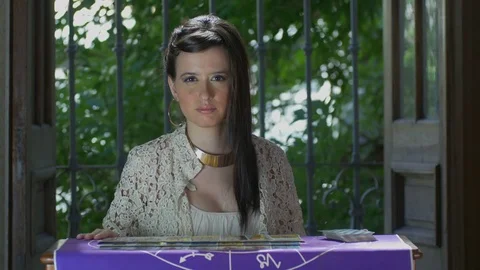 Tarot reader dealing cards &amp; reading future and fortune Stock Footage 76703190