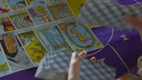 Tarot reader dealing cards &amp; reading future and fortune Stock Footage 76718288