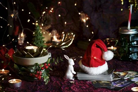 Tarot reader or Fortune teller reading on Christmas decoration. Stock Photos