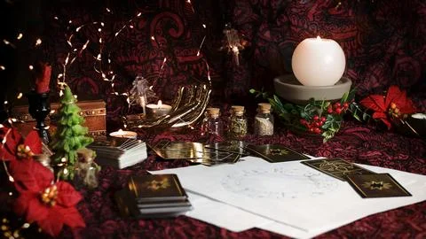 Tarot reader or Fortune teller reading on Christmas decoration. Stock Photos
