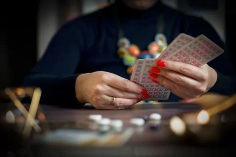 Tarot reader or fortune teller holding tarot cards Stock Photos