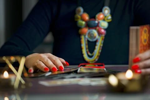 Tarot reader or fortune teller holding tarot cards Stock Photos