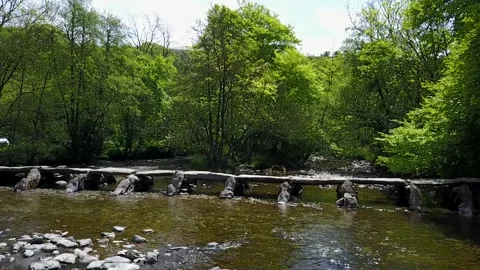 Tarr Steps Clapper Bridge, Megalithic Construction in Exmoor UK, Epic Clip HD Stock Footage 315077813