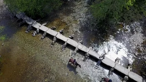 Tarr Steps Clapper Bridge, Megalithic Construction, Exmoor, Drone Clip HD Stock Footage 315077819