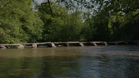 Tarr Steps highlighting the alignment of large, weathered stones forming the Stock Footage 343897000