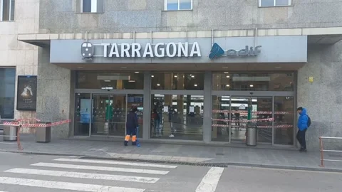 Tarragona train station sees empty platforms, passenger discontent due to strike Stock Footage 328508903