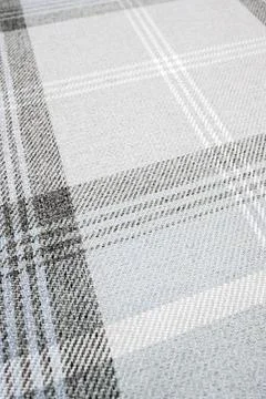 Tartan pattern displaying a close up of gray and white wool fabric texture .. 스톡 사진