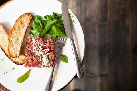 Tartare of beef with spinach. Stock Photos