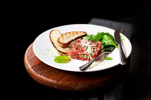 Tartare of beef with spinach. Stock Photos
