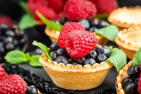 Tartlets with berries Stock Photos
