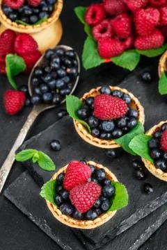Tartlets with berries Stock Photos
