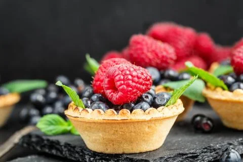 Tartlets with berries Stock Photos