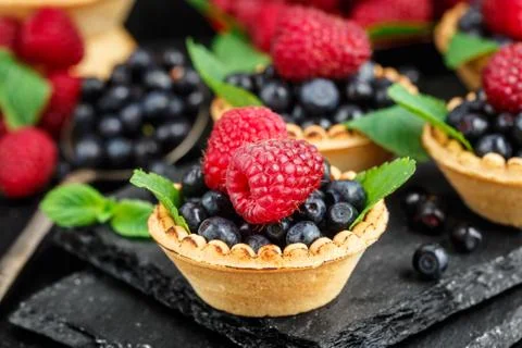 Tartlets with berries Stock Photos
