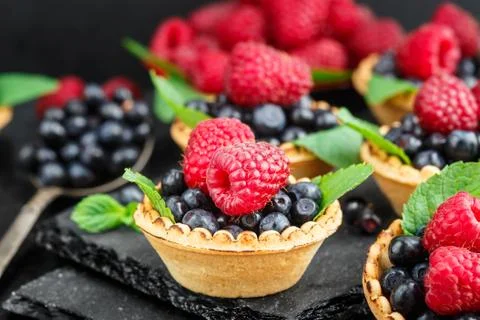Tartlets with berries Stock Photos