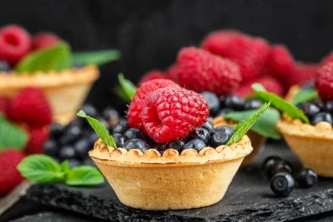 Tartlets with berries Stock Photos
