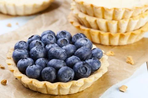 Tartlets with blueberries Stock Photos