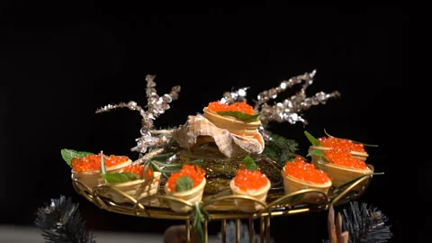 Tartlets with red caviar. slow motion 库存影片 101459814