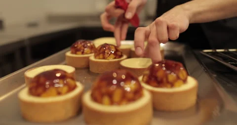 Tartlets on the table of a professional confectioner Stock Footage 262213408