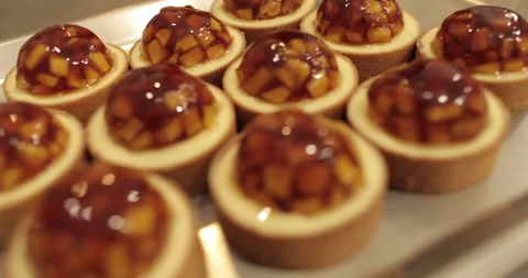 Tartlets on the table of a professional confectioner Stock Footage 262213611