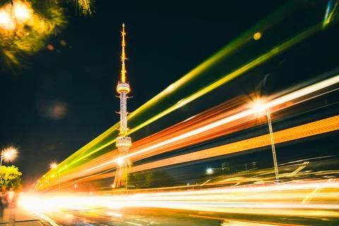 Tashkent soviet architecture TV tower Uzbekistan. Time lapse night city tra.. Stock Photos