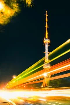 Tashkent soviet architecture TV tower Uzbekistan. Time lapse night city tra.. Stock Photos