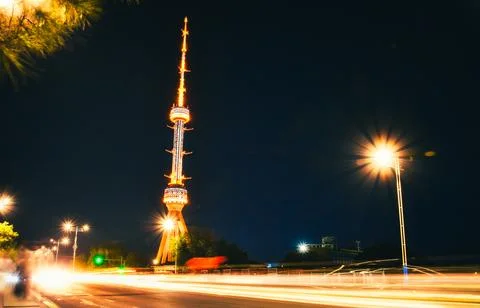 Tashkent soviet architecture TV tower Uzbekistan. Time lapse night city tra.. Stock Photos