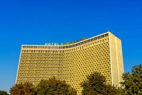 Tashkent, Uzbekistan - October 16, 2023: View to facade of Hotel Uzbekistan.. Stock Photos